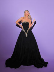 black evening gown featuring golden details