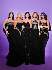 black evening gowns featuring gold details