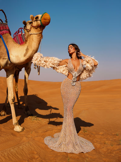 nude evening gown with a feathery boa