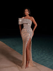 nude evening gown featuring a side slit