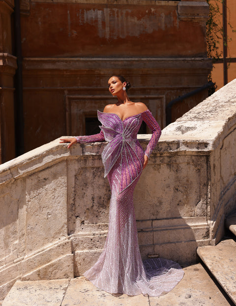 purple evening gown featuring a butterfly detail