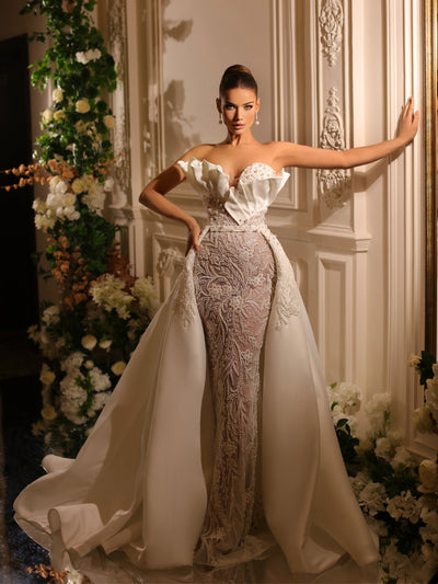 bridal gown featuring a removable tail