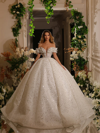 bridal ball gown featuring an off-shoulder neckline