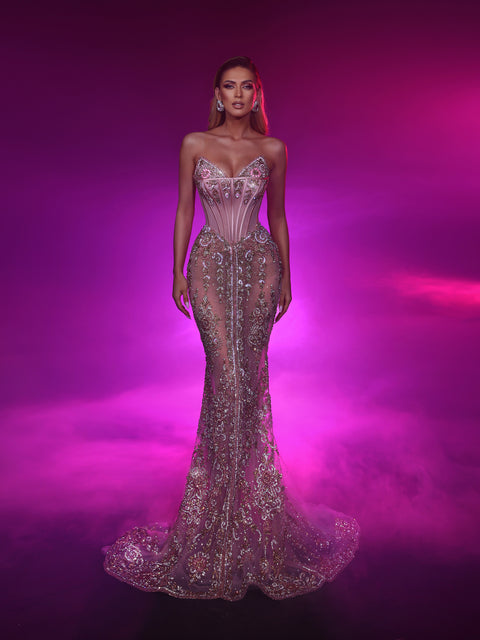 a light pink evening gown featuring a strapless neckline and a long train